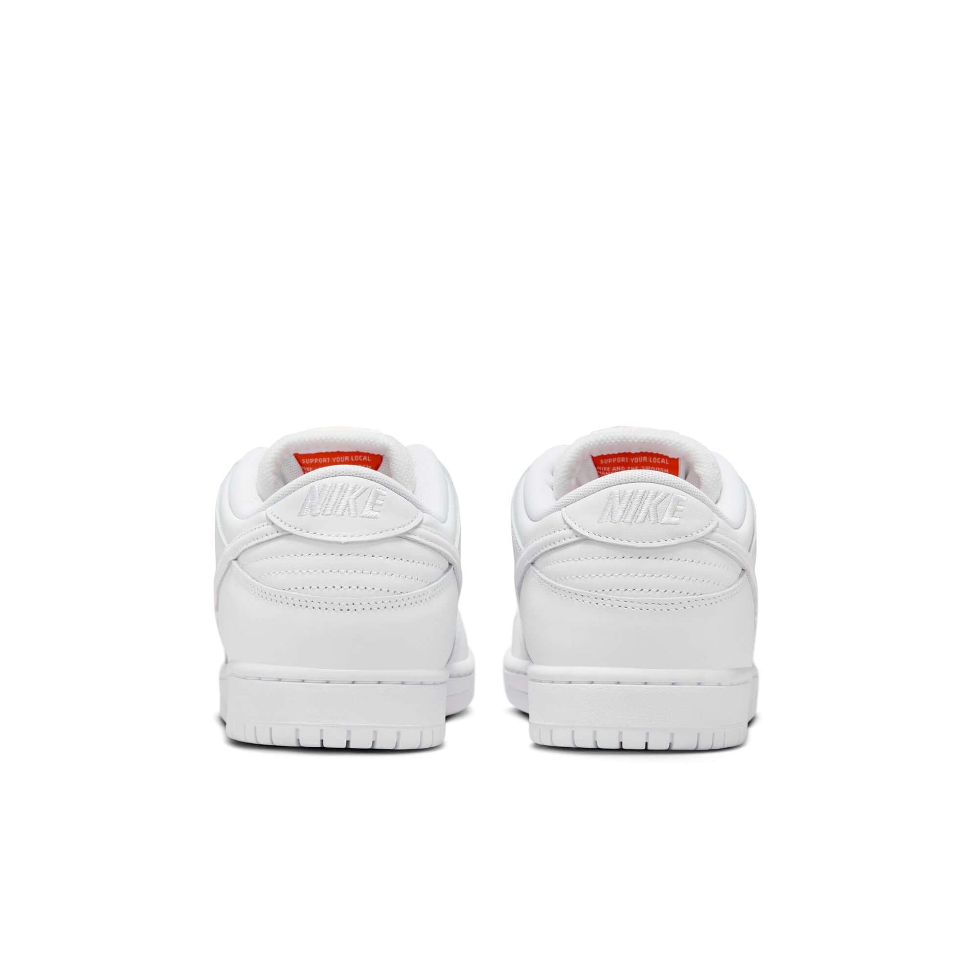 Rear view of NIKE SB Dunk Low Pro sneakers in white color with padded low-cut collar and classic details.