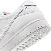 Close-up of the Nike SB Dunk Low Pro in white, featuring a low-cut padded collar and rubber outsole with classic pivot circle for durability.