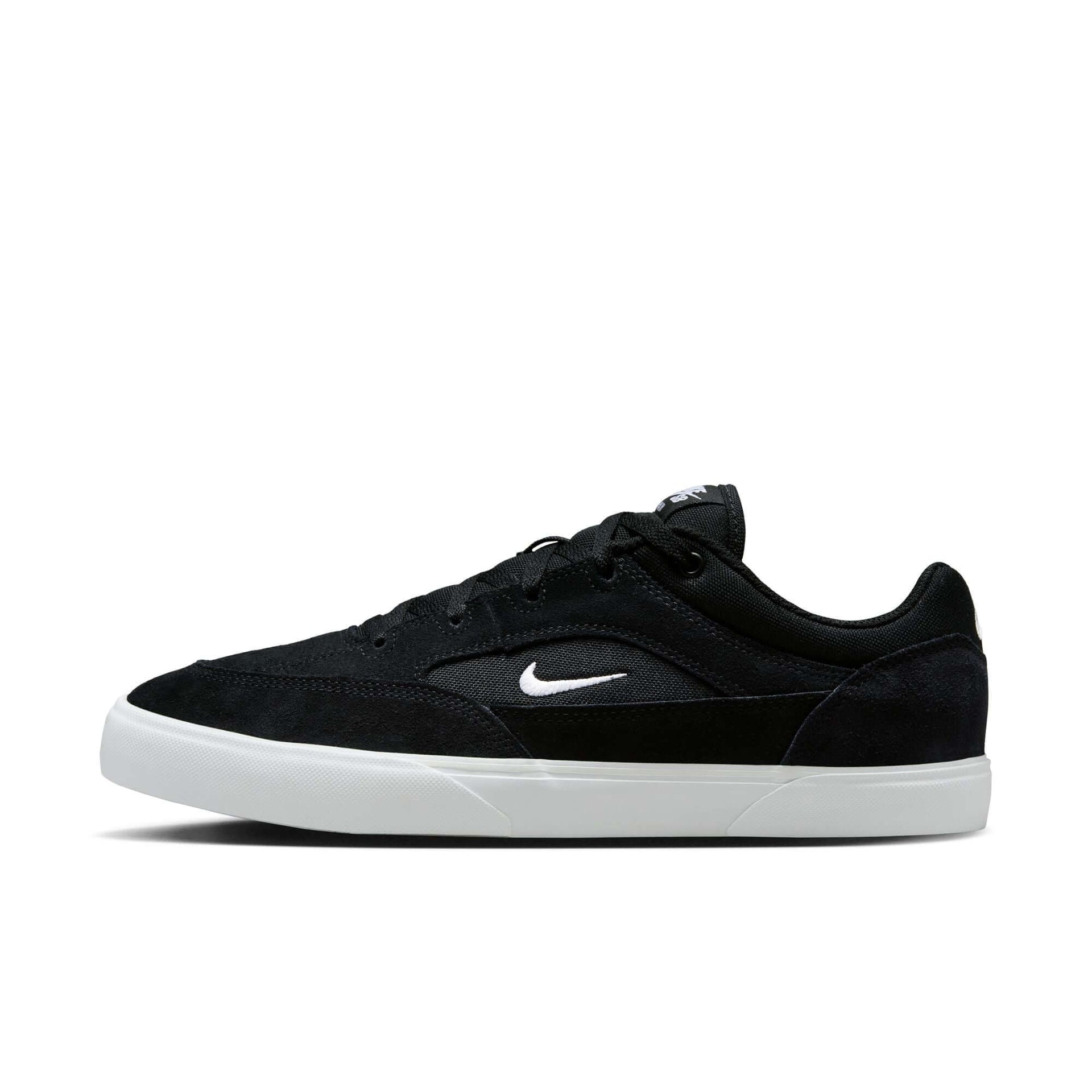 NIKE SB Malor black and white skate shoe with suede and canvas upper, designed for durability and grip for entry-level skaters.