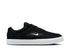 Black and white NIKE SB Malor skate shoe with suede and canvas upper designed for durability and grip.