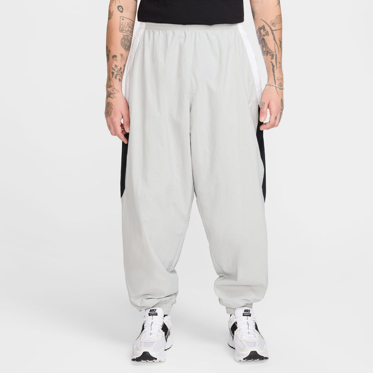 NIKE - OVERSIZED WOVEN TRACK PANTS - LIGHT SMOKE GREY / WHITE / BLACK