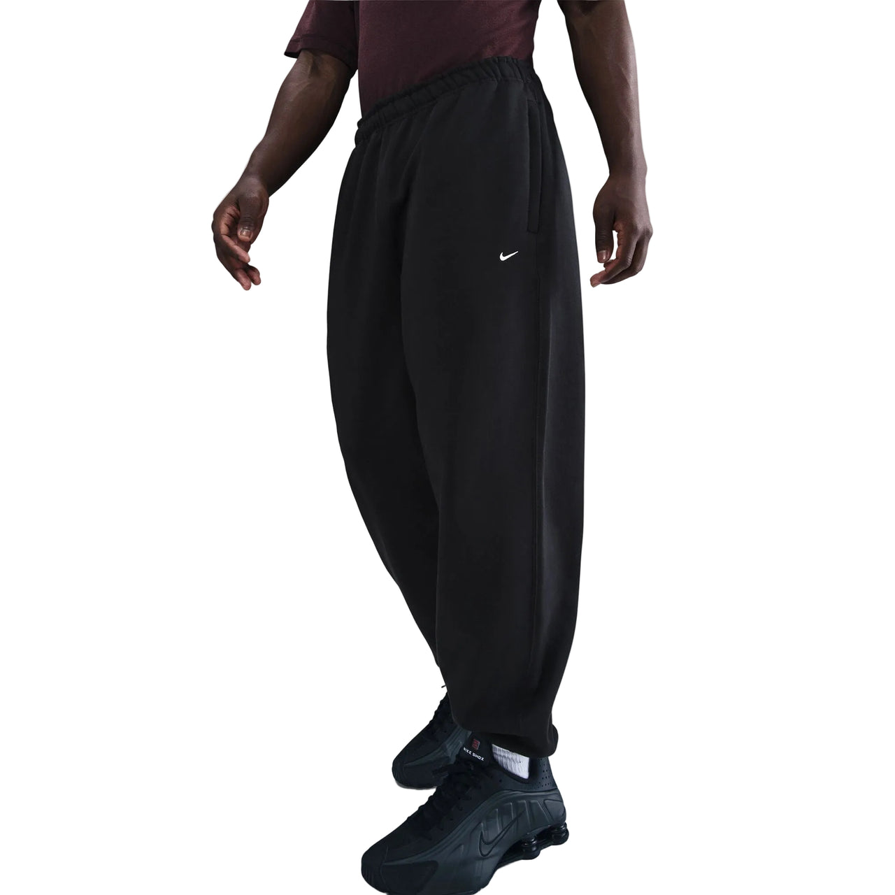 NIKE - SOLO SWOOSH CUFFED FLEECE PANTS - BLACK / WHITE
