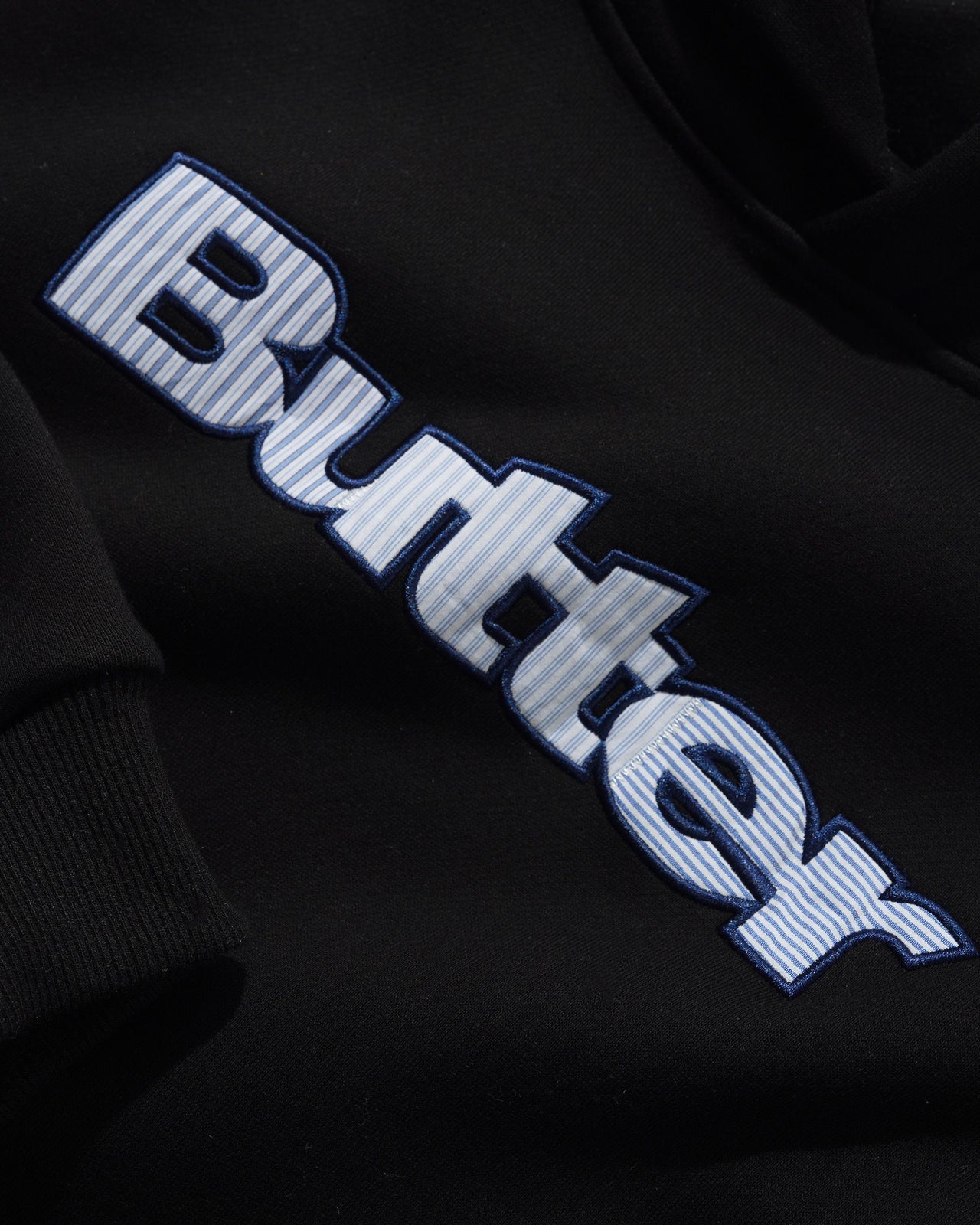 BUTTER GOODS - STRIPE LOGO APPLIQUE PULLOVER HOOD - BLACK