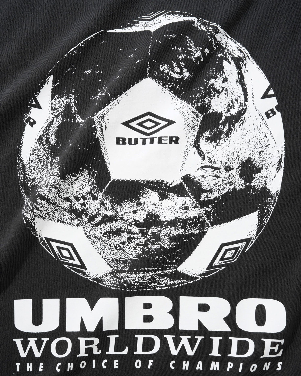 BUTTER GOODS X UMBRO - WORLD GAME TEE - WASHED BLACK