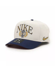White and blue Nike cap with gold accents on a white background