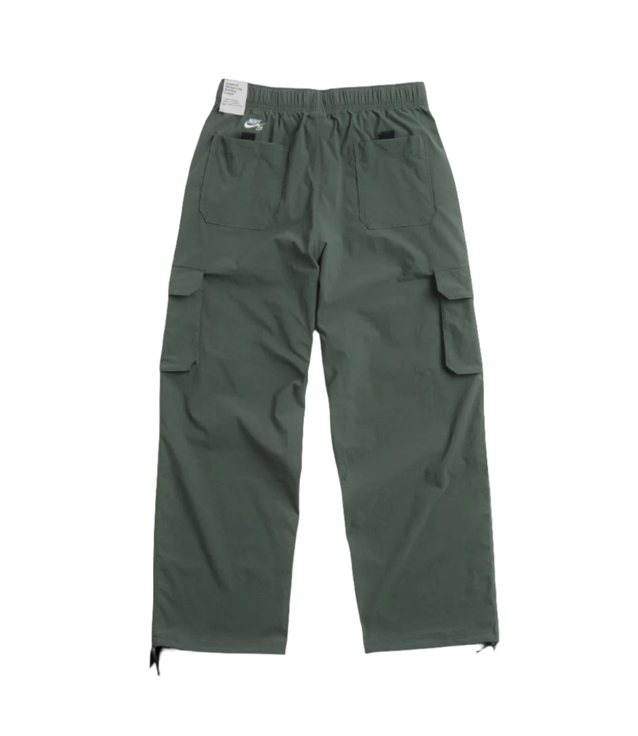 Nike SB Kearny Cargo Pant in Vintage Green with six pockets, shown flat with elastic waistband and ties at the hem for adjustable fit